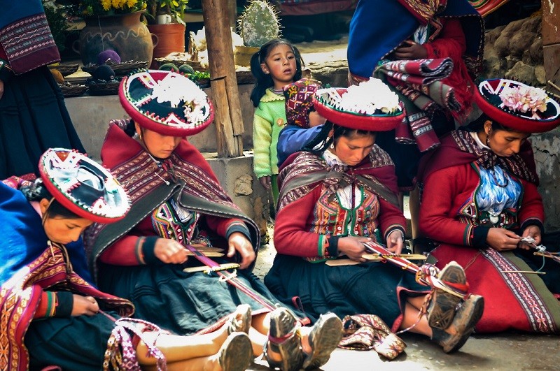 Traditional weaving by local women, visit Chinchero on your Peru tour section